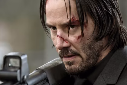 keanu reeves holding shotgun in john wick